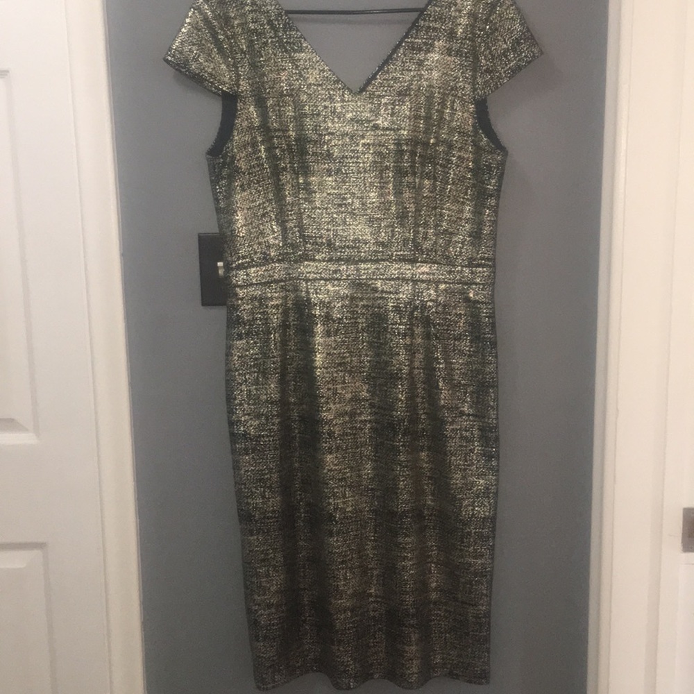 Fun and flirty, gold tweed cap-sleeve dress.